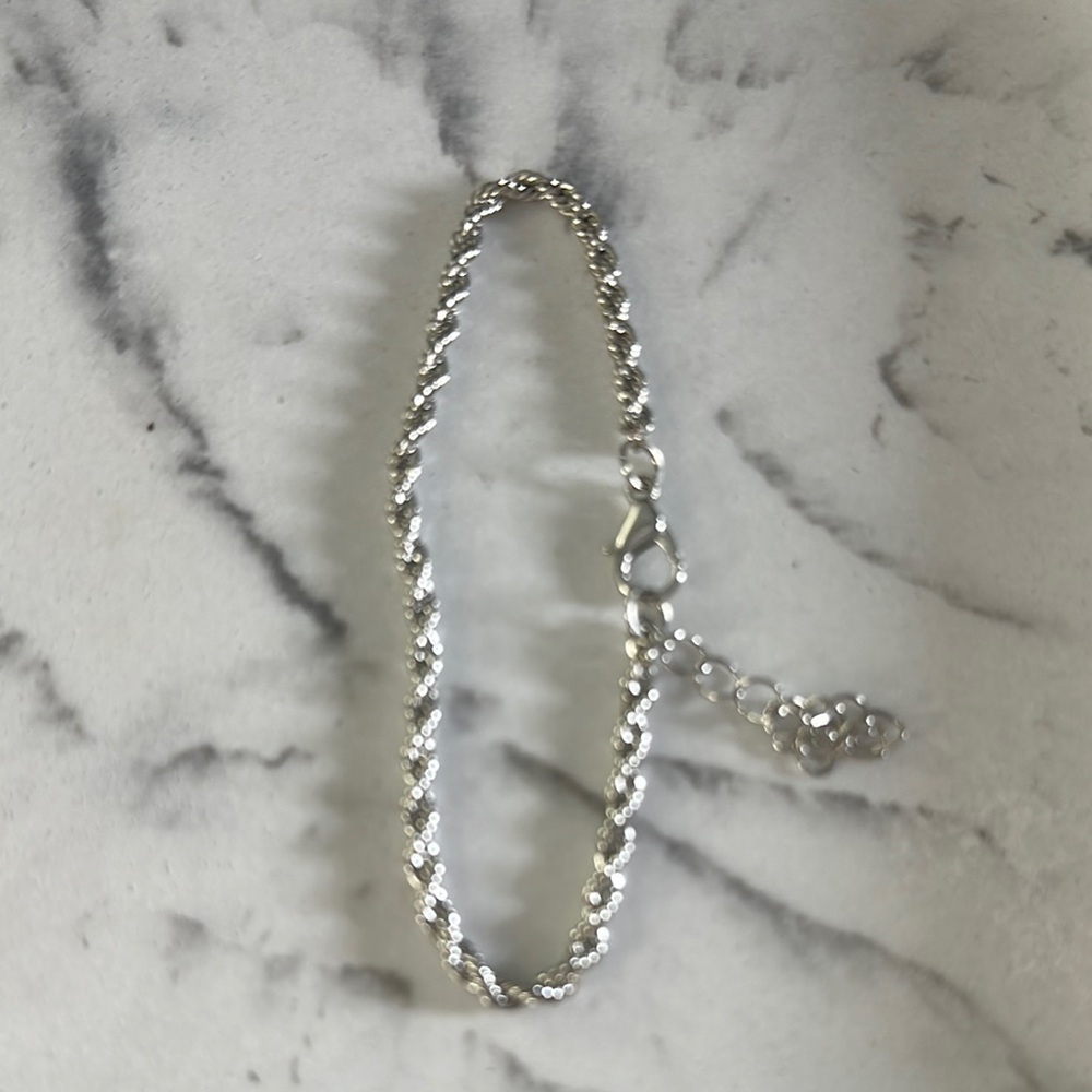 Elegant Silver Twist Bracelet